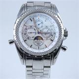 Estate Invicta stainless steel wristwatch with mother-of-pearl dial: 1 3/8" case, Swiss quartz movement, 7 1/2" bracelet, sapphire crystal, water resistant, 4136. Watch is running.