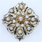 Estate 14K yellow gold diamond pin / pendant with ~2.09 ctw in diamonds; a ~0.25 ct round brilliant center diamond (SI2 clarity, H color) & ~1.84 ctw in round brilliant accent diamonds (SI2 to I1 clarity, G to I color): 1 9/16", 14.6 gms gross weight. Appraised in 2013 by Jewelry Exchange and Auction for $3,800.