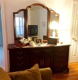 A solid cherry dresser with mirror from the Holliday House