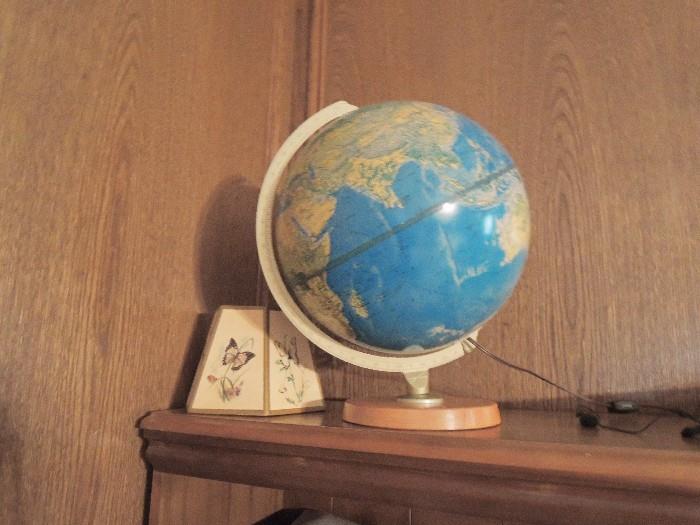 light up globe and globe on maple stand