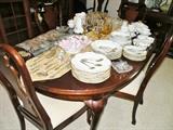 Cherry dining room table with six chairs. Haviland gold edged china.