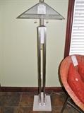 Art Deco style stone and metal floor lamp. 