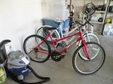 Two girl's bikes. Shop vac.
