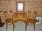 Cute little drop leaf table and two chairs