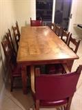 8.25 ft. 100 yr. old  Spanish style farm house table w/10 chairs