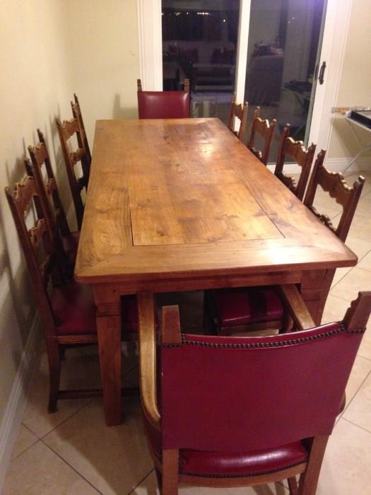 8.25 ft. 100 yr. old  Spanish style farm house table w/10 chairs