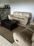 Reclining Tan leather sofa and love seat