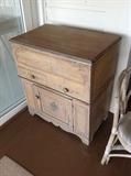Antique painted liquor cabinet - folds open at top $ 220.00