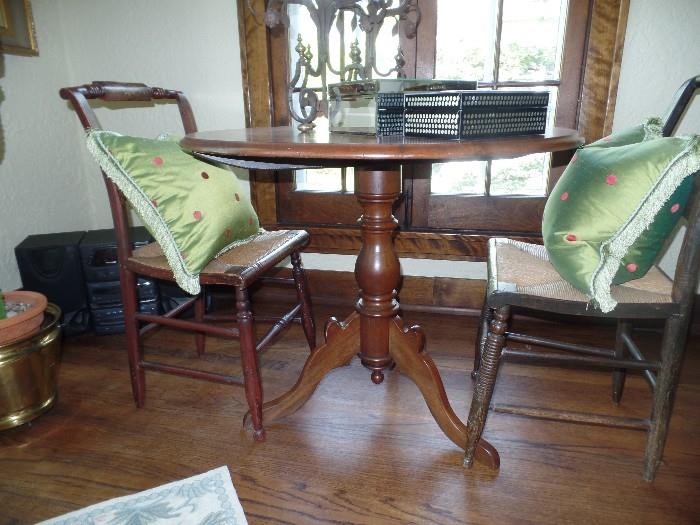 Antique flip top table. (pillows not included)  assorted side chairs