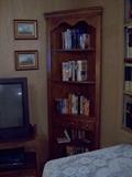 Corner cabinet and hard cover books