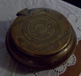 Vintage brass National golf sponge box.