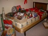 Twin bed by Dixie Furniture Company displaying Christmas decorations