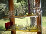 Assorted collectible glassware including Kellogg's creamer, Fostoria two-light candelabra, etc.