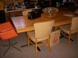 Table and chairs, punch bowl, orange chair is unmarked