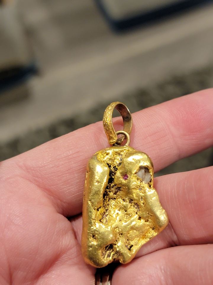 100 24k gold nugget weighs 25.44 