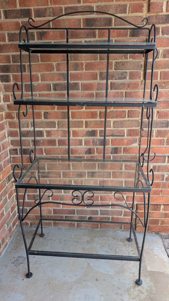 Cozy home variety sale with furniture, musical instruments, books, and home goods