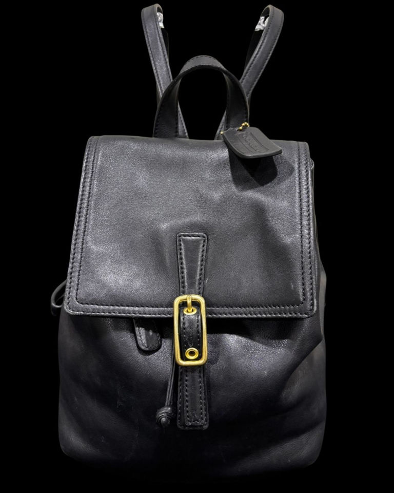 Vintage Authentic black leather Coach backpack with gold 
