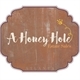 A Honey Hole Estate Sales Logo