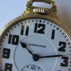 Heriloom Clocks, LLC Logo