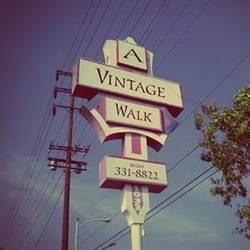 A Vintage Walk Estate Sale Services Logo