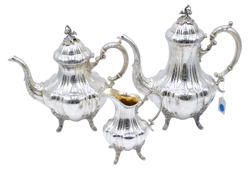 Mroczek Brothers Auctioneers & Associates/Seattle Auction House Logo